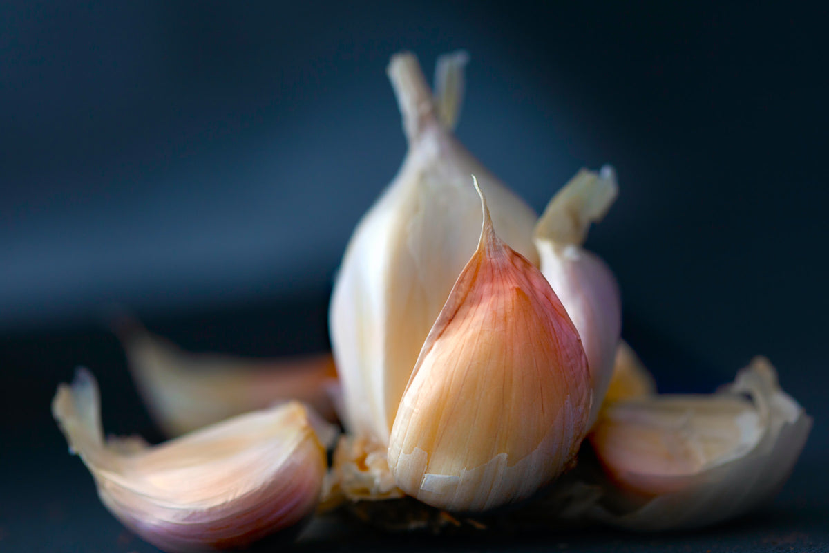 When using a garlic press, you do NOT need to peel the clove first