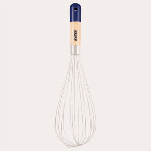 The Zyliss Beech Wood Balloon Whisk has stainless steel wires, a beech wood handle with a blue tip, small hanging hole, and printed logo. Shown on a plain white background.