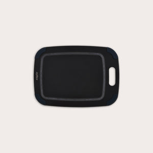 The Zyliss Wood Fibre Cutting Board is rectangular with rounded edges, a built-in handle, and dark blue corner grips. Made from recycled wood fibres, it is shown on a plain light background. #Small