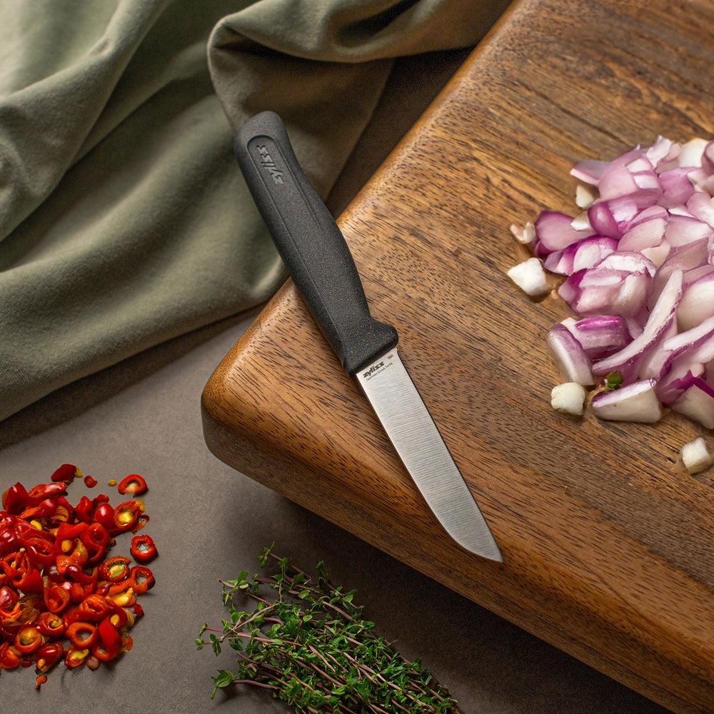 A Zyliss Vegetable Knife 9cm / 3½" with a black handle and silver blade is displayed next to a circular "4 for 3 mix & match" label on a plain light background.