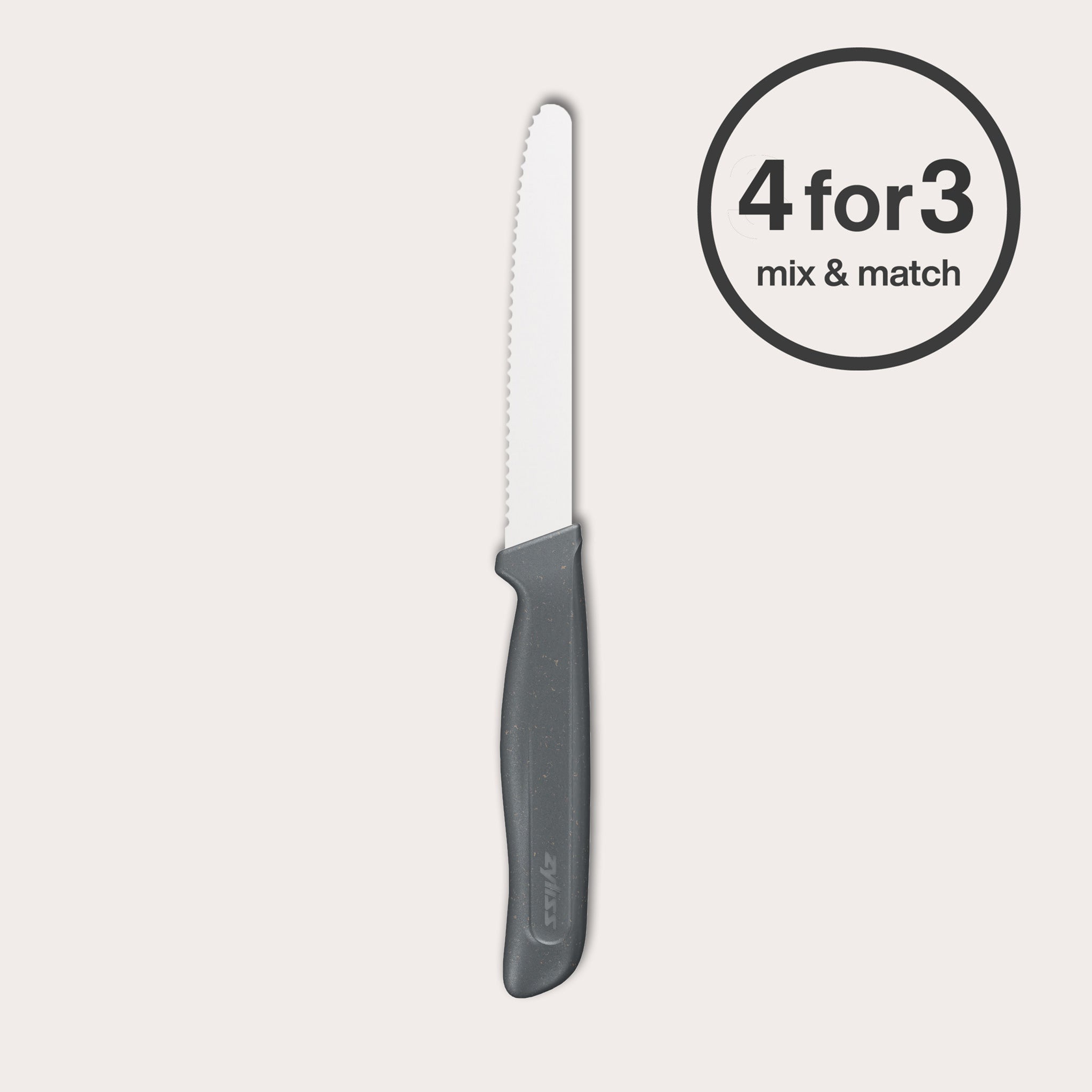 A Zyliss Tomato Knife Serrated 11cm/4½" with a black handle stands upright next to a round "4 for 3 mix & match" label against a light background.