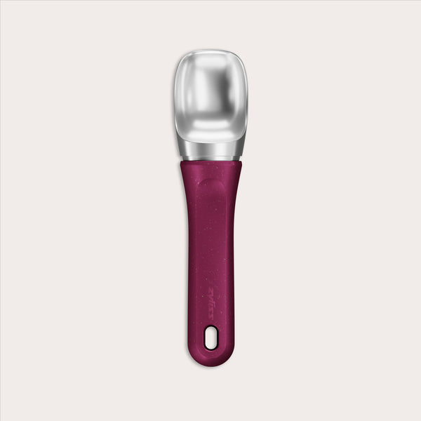 #berry The Zyliss Ice Cream Scoop features a wide, flat stainless steel scoop and an eco-friendly handle, displayed against a plain light background.