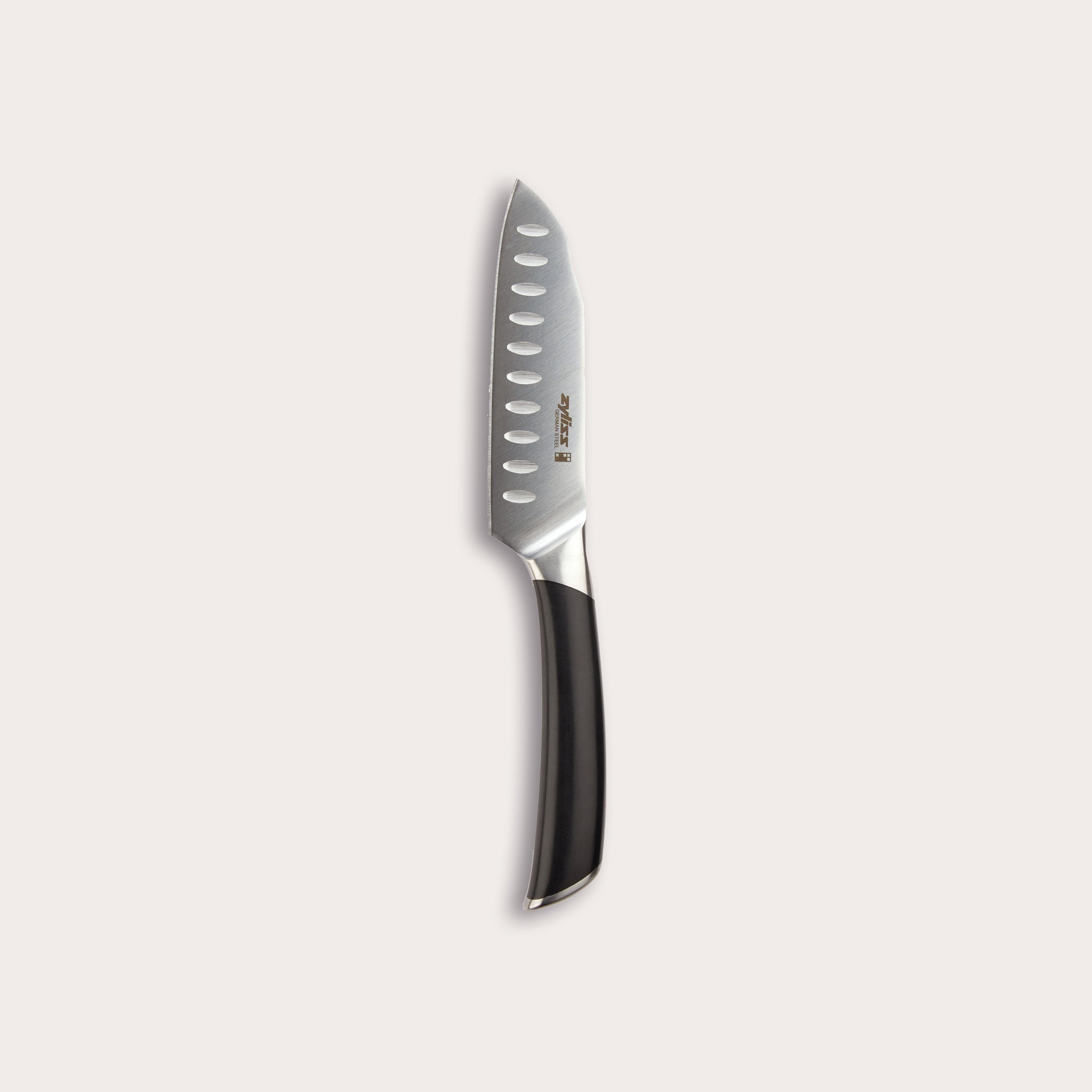 The Zyliss Comfort Pro Mini Santoku Knife 13cm/5 features an ergonomic handle and oval indentations on its German stainless steel blade, displayed against a plain, light background.