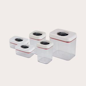 The Zyliss Twist & Seal 5 Piece Container Set features transparent plastic containers in various sizes with white twist-lock lids and black buttons, ideal for versatile kitchen storage.
