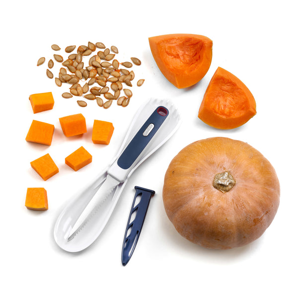 Whole pumpkin, cubes, seeds, and wedges are arranged with the Zyliss 3 In 1 Pumpkin & Squash Scoop & Knife—featuring a blue and white serrated blade and cover—the perfect kitchen tool for pumpkin prep.