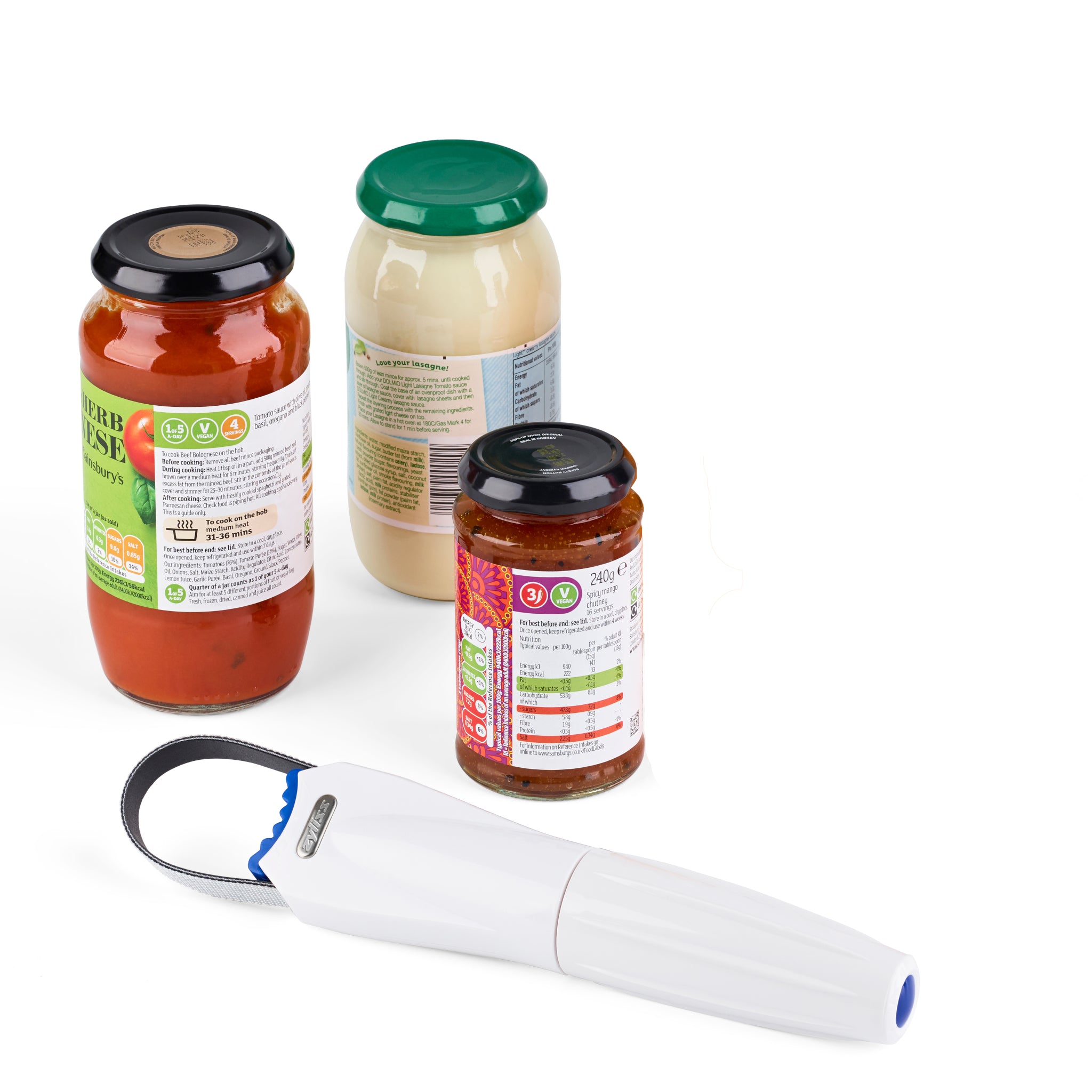Three jars with different colored lids and contents are placed near a white handheld jar opener with a black rubber grip, all set against a white background.