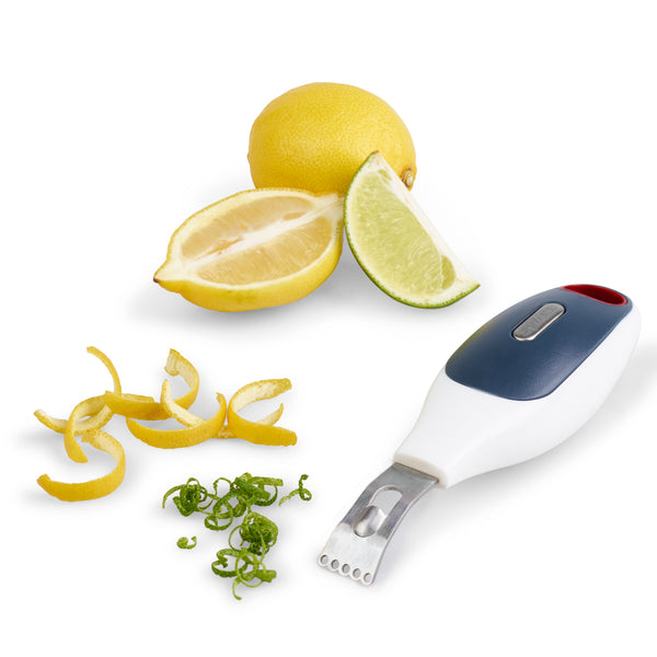 A whole lemon, a lemon half, a lime wedge, and citrus zest are arranged beside the Zyliss 2 In 1 Zester with an ergonomic handle on a white background.