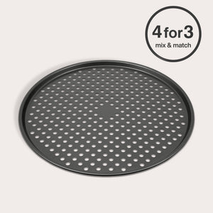A round, black Zyliss Non-Stick Pizza Tray is displayed on a light background. In the top right corner, a circular label reads "4 for 3 mix & match—perfect for achieving a crispy pizza base every time.