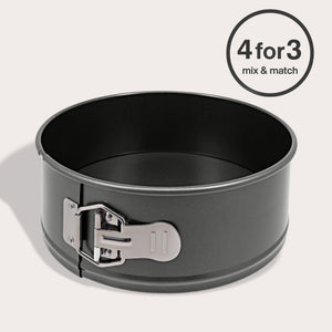 #23cm/9" The Zyliss Non-Stick Springform Cake Pan, crafted from durable carbon steel with a metal latch, is shown on a light background. A "4 for 3 mix & match" offer appears in a circle at the top right.
