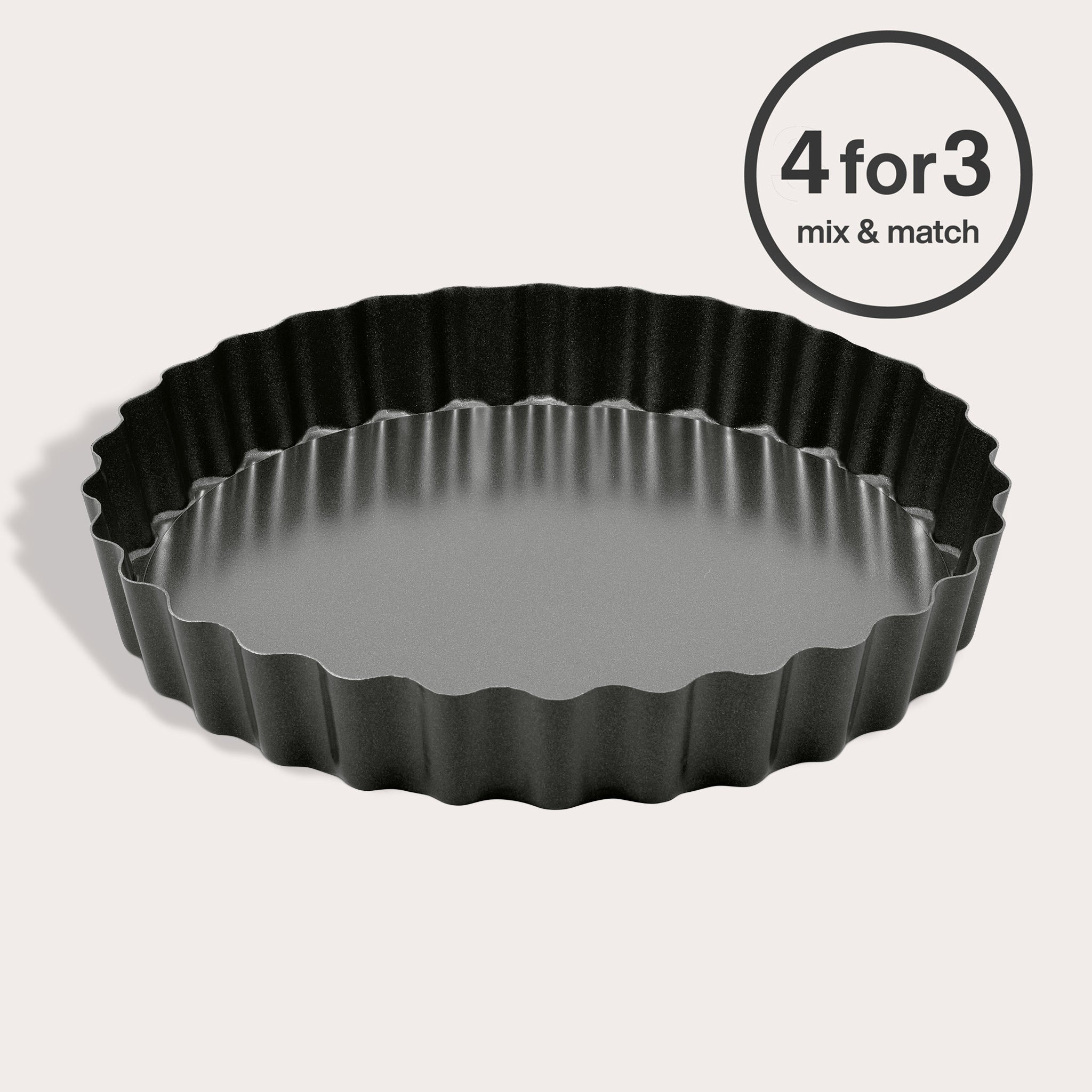 A Zyliss Non-Stick Tart Pan with a removable base is displayed on a light background, featuring a "4 for 3 Mix & Match" circular offer label in the top right corner.