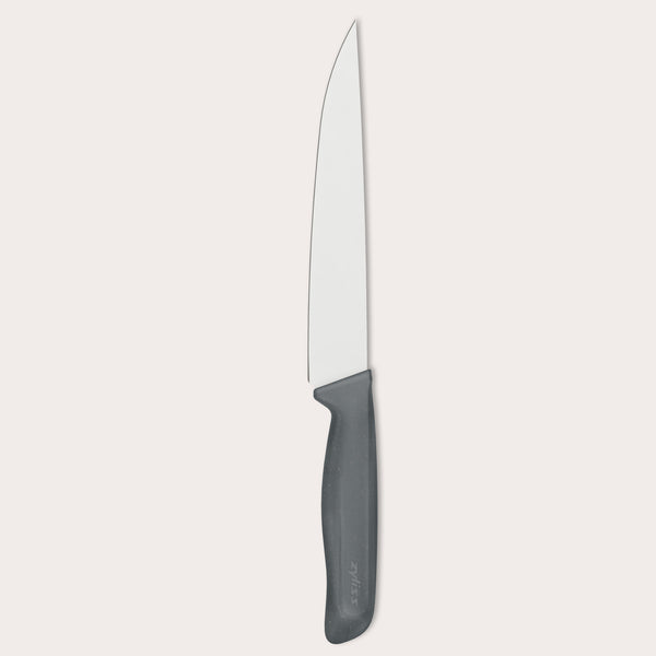 The Zyliss Large Carving Knife 19cm/7.4" features a long, sharp stainless steel blade and a black ergonomic wheat straw handle, displayed against a plain white background.