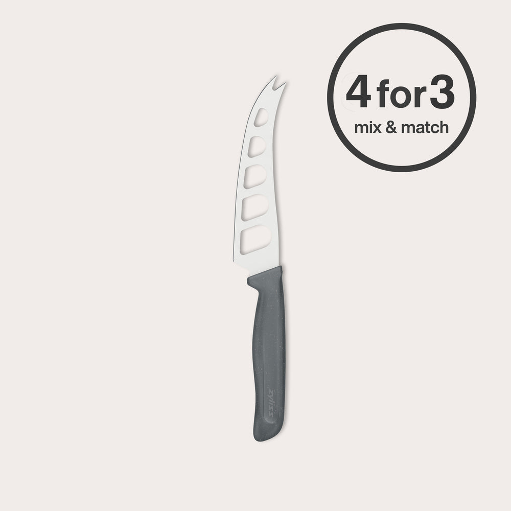 The Zyliss Cheese Knife 12.7cm/5" with a stainless steel blade, black wheat straw handle, and cut-out blade holes is displayed next to a "4 for 3 mix & match" circular label on a plain light background.
