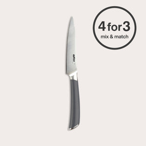 The Zyliss Comfort Pro Paring Knife 11cm / 4½" with an ergonomic gray handle stands upright on a light background. A circular label on the right displays "4 for 3 mix & match.