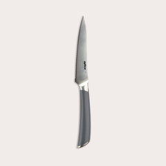 The Zyliss Comfort Pro Serrated Paring Knife 11.5cm features a German stainless steel silver blade and ergonomic gray handle, displayed against a plain light background.