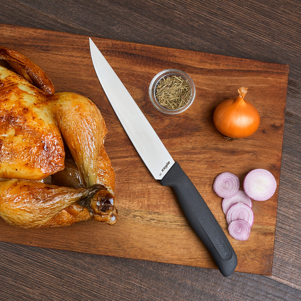 The Zyliss Large Carving Knife 19cm/7.4" features a sustainable handle and stainless steel blade, shown upright with a circular "4 for 3 mix & match" label in the top right corner.