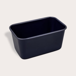 A rectangular, deep, dark-colored Zyliss Durable Non-Stick Loaf Pan sits on a light background. A circular label in the top left corner reads 3 for 2 mix & match. #1L/1lb