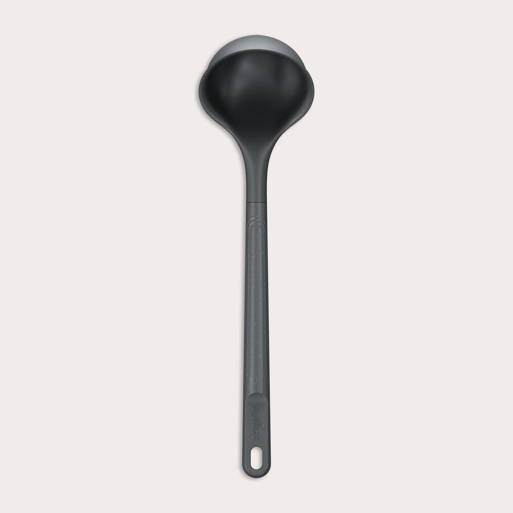 #medium A Zyliss Ladle in black with a long handle and deep, rounded bowl is displayed against a plain white background. #Medium