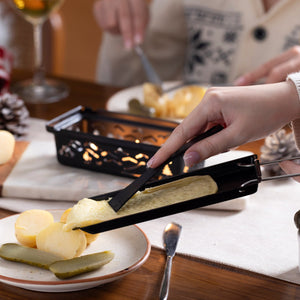 Zyliss Tandem Candlelight Fondue & Raclette Set — in use