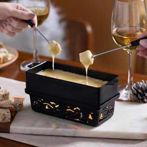 Zyliss Tandem Candlelight Fondue & Raclette Set — in use