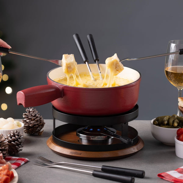 Zyliss Chalet Cast Iron Cheese Fondue Set, Red — in use