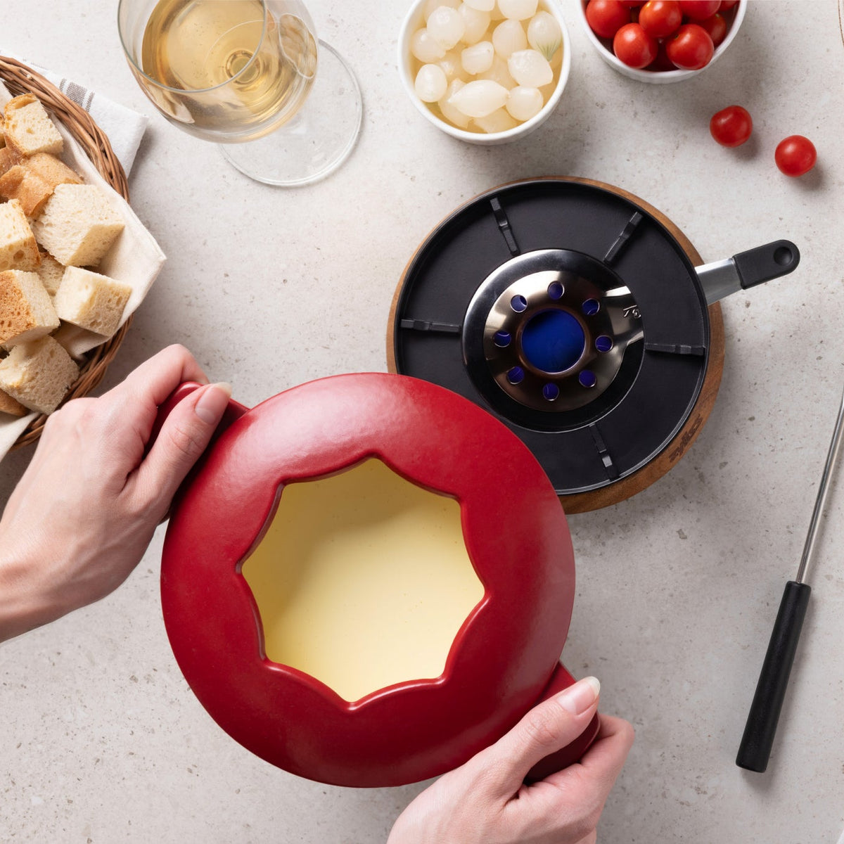 Zyliss Alpine Cast Iron Fondue Set, Red — in use