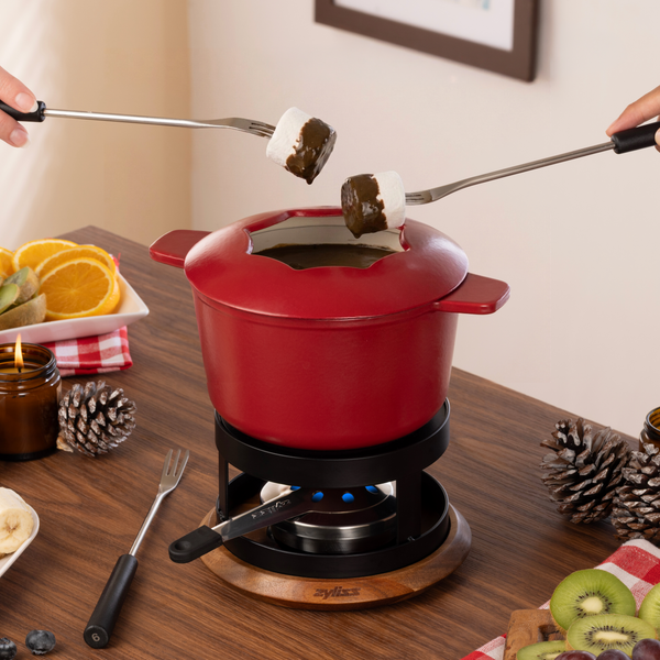 Zyliss Alpine Cast Iron Fondue Set, Red — in use