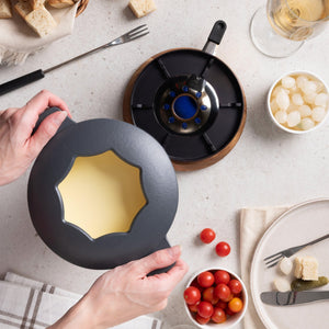 Zyliss Alpine Cast Iron Fondue Set, Beluga — in use
