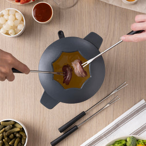 Zyliss Alpine Cast Iron Fondue Set, Beluga — in use