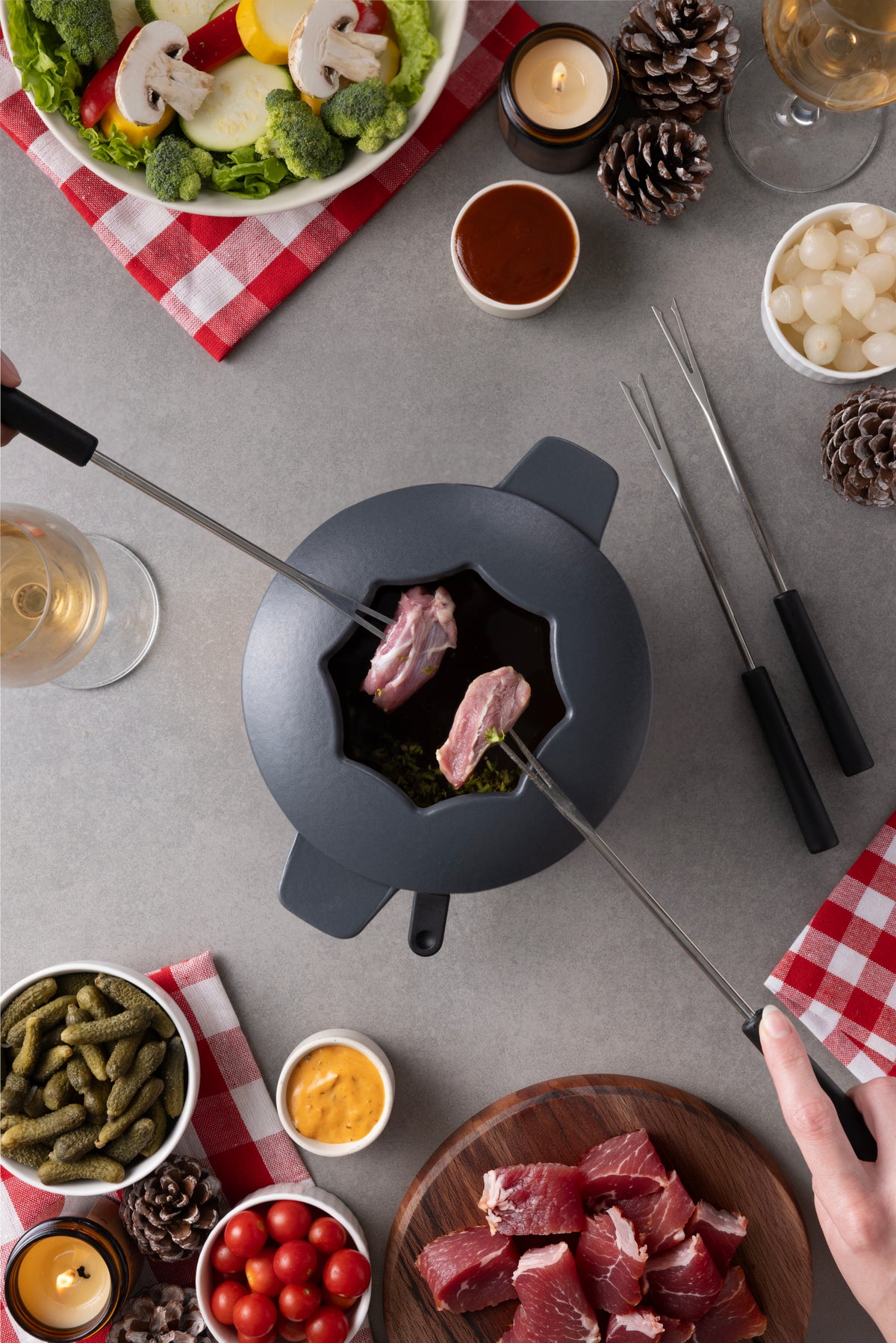 Zyliss Alpine Cast Iron Fondue Set, Beluga — in use