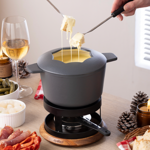 Zyliss Alpine Cast Iron Fondue Set, Beluga — in use