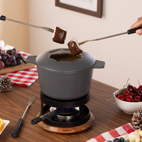 Zyliss Alpine Cast Iron Fondue Set, Beluga — in use