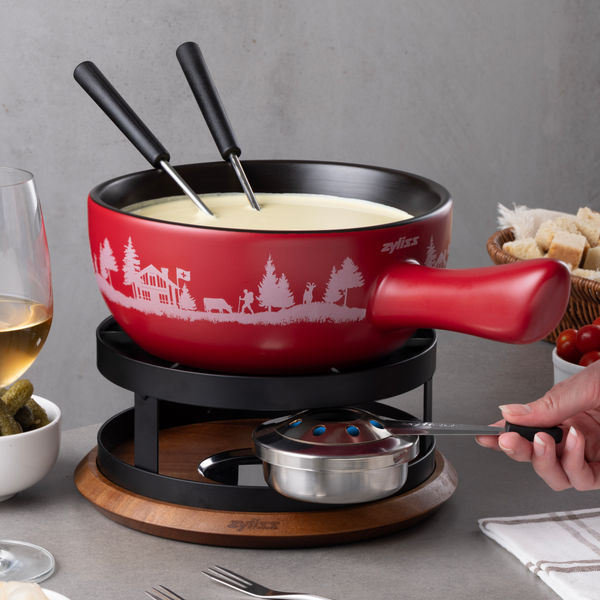 Zyliss Chalet Ceramic Cheese Fondue Set, Red — in use