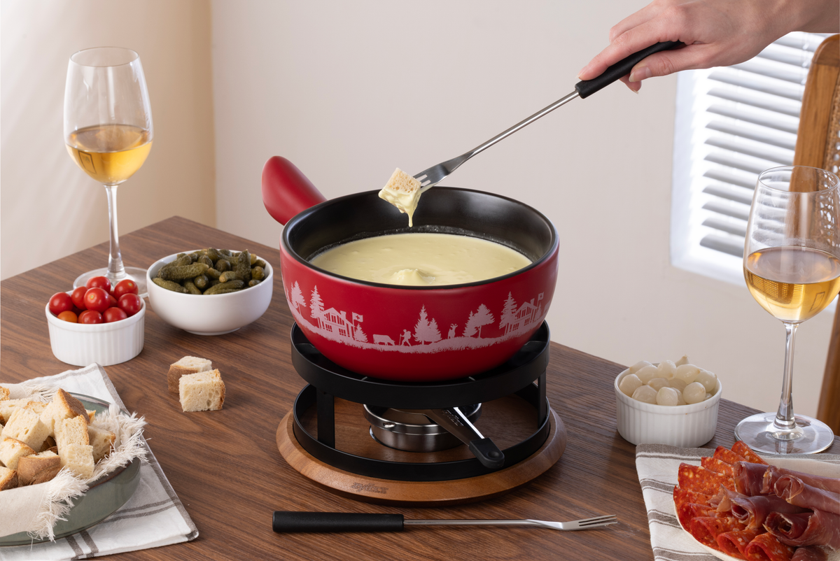 Zyliss Chalet Ceramic Cheese Fondue Set, Red — in use