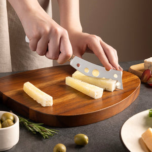 Zyliss Signature Semi-Soft Cheese Knife 116mm/4.6in — in use