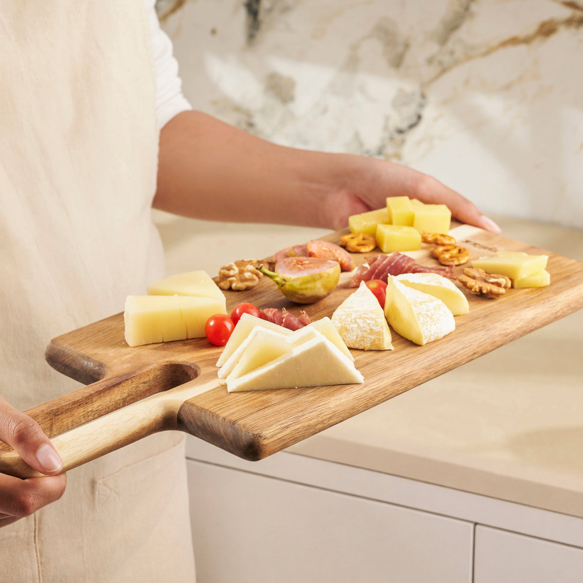 Zyliss Serving Board Acacia Wood M 43x18cm/17x7.1in — in use