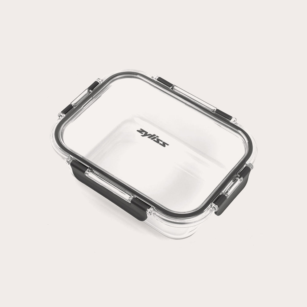 The Zyliss 3-Piece Set Glass Container Set features clear rectangular borosilicate glass containers with black locking clips and transparent, leak-proof lids. The Zyliss logo is displayed at the center of each lid.