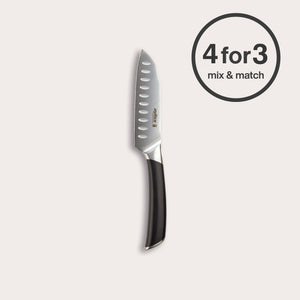 The Zyliss Comfort Pro Mini Santoku Knife 13cm/5" with an ergonomic black handle is shown on a plain light background. A circular label at the top right corner states "4 for 3 mix & match." Made from premium German stainless steel.