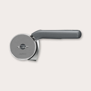 The Zyliss Pizza & Pastry Cutter features a round metal blade and an ergonomic handle, shown against a plain white background. 