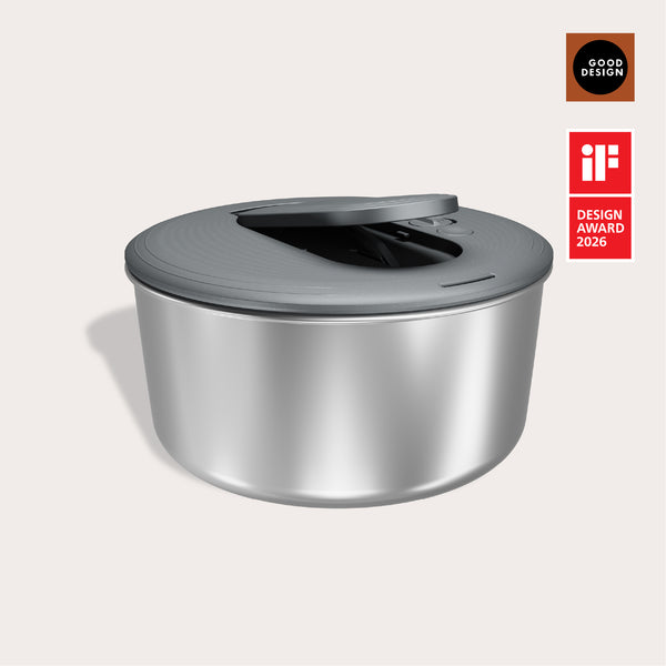 The Zyliss Swift Dry Salad Spinner Stainless Steel features a sleek silver bowl with a modern gray lid and handle. Shown are the Good Design and iF Design Award 2026 logos, highlighting its award-winning style and durability.