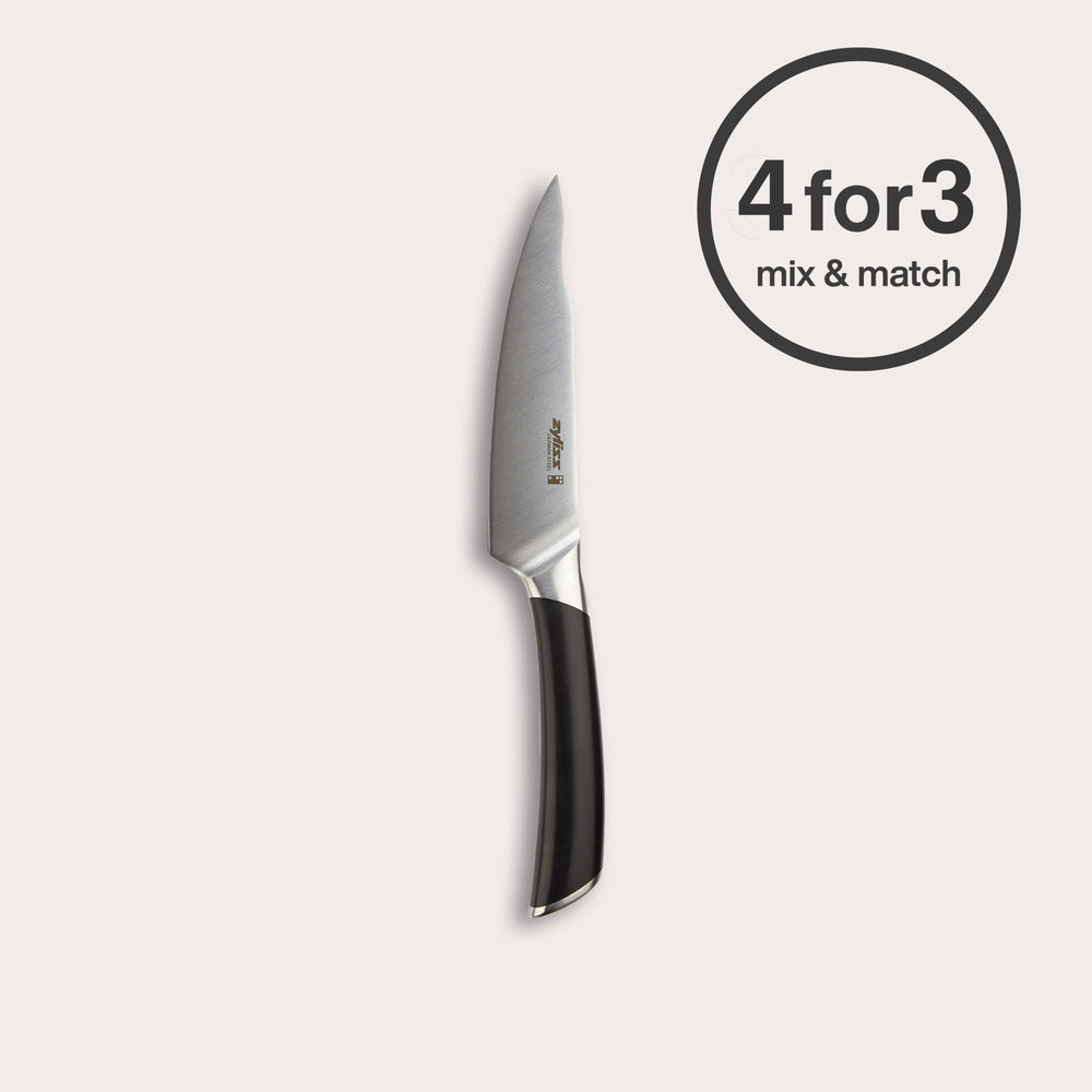 The Zyliss Comfort Pro Utility Knife 14cm with an ergonomic black handle is centered on a light background. A circular "4 for 3 mix & match" label appears in the top right corner.