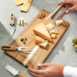 Zyliss 4 Piece Artisan Petite Cheese Knives & Serving Board Set — in use