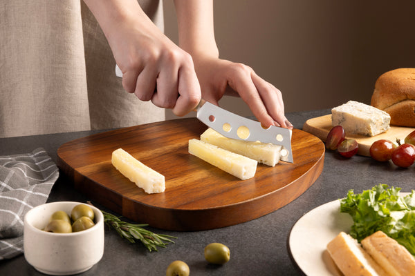 Zyliss Signature Semi-Soft Cheese Knife 116mm/4.6in — in use