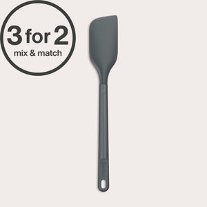 A dark grey Zyliss Spatula with a heat-resistant silicone head and handle hole is shown on a light background. A circular label in the top left corner reads 3 for 2 mix & match.#Medium