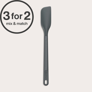 A long-handled Zyliss Spatula in dark gray with a heat-resistant silicone head is displayed on a light background. A 3 for 2 mix & match circular label appears in the top left corner.#Small