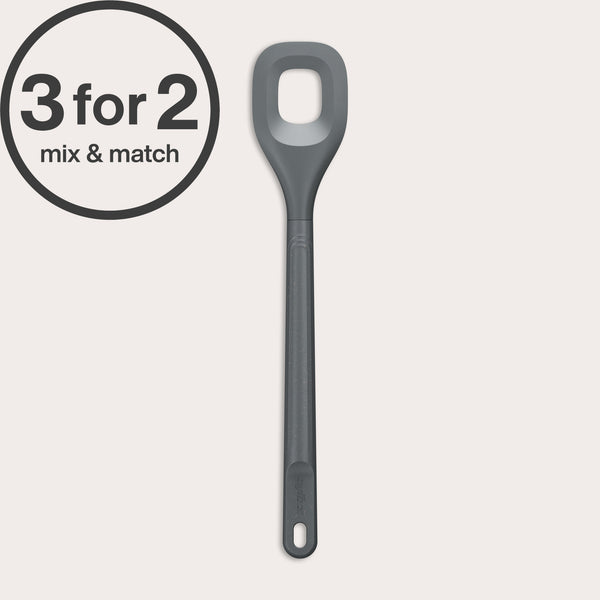 A long-handled, grey Zyliss Square Mixing Spoon made from heat-resistant silicone with a hole in the center is shown—an eco-friendly kitchen essential. A circular label at the top left displays 3 for 2 mix & match.