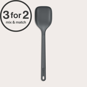 A dark gray, heat-resistant Zyliss Spoon with a hole in the handle is shown vertically against an off-white background. A 3 for 2 mix & match circular label appears in the top left corner.#Large