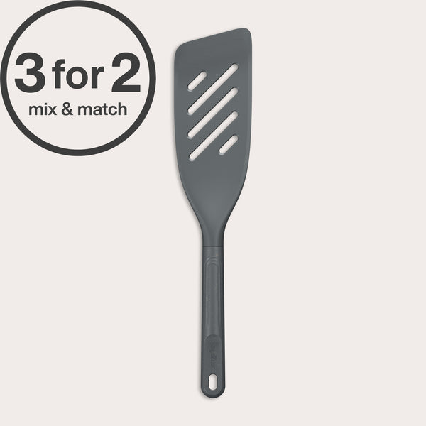 A dark gray Zyliss Fish Turner with a slotted, heat-resistant design and ergonomic handle is displayed on a white background. A circular 3 for 2 mix & match label appears in the top left corner.
