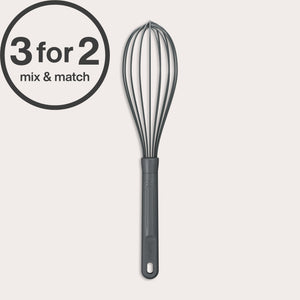 A Zyliss Balloon Whisk Silicone with a black silicone-coated head and gray handle stands upright on a light background. A circular 3 for 2 mix & match label appears in the top left, highlighting its suitability for non-stick cookware.
