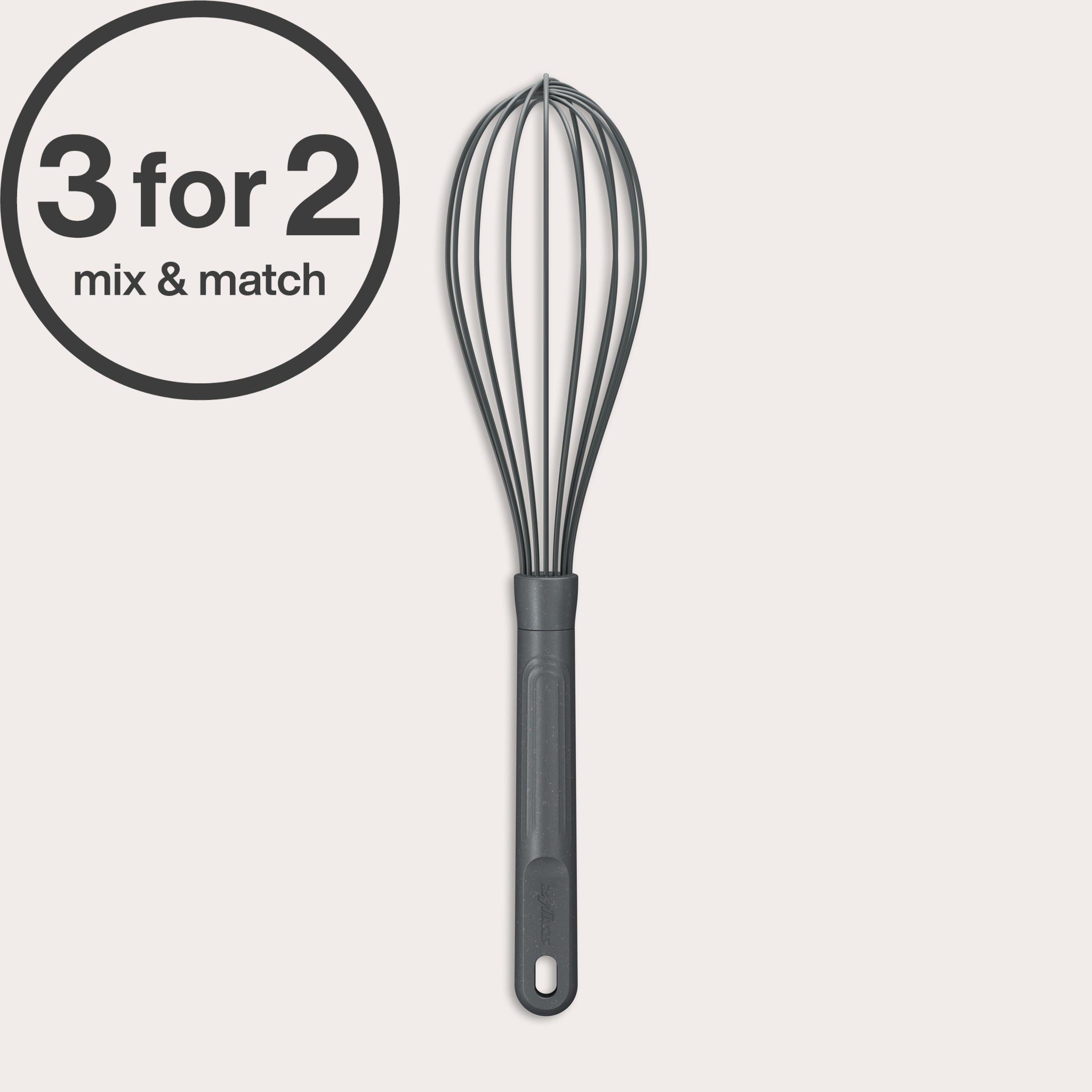 A Zyliss Balloon Whisk Silicone with a black silicone-coated head and gray handle stands upright on a light background. A circular 3 for 2 mix & match label appears in the top left, highlighting its suitability for non-stick cookware.