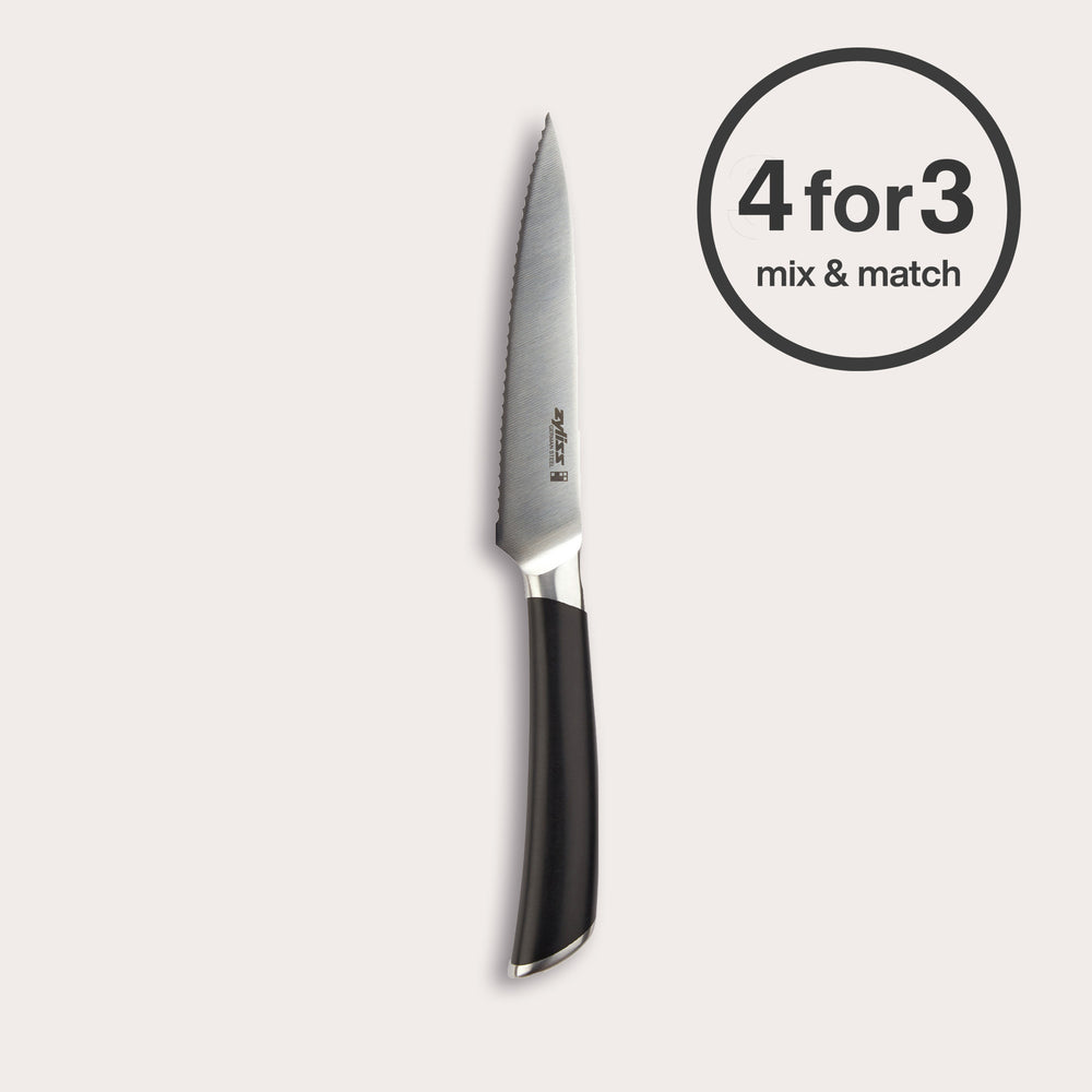 The Zyliss Comfort Pro Serrated Paring Knife 11cm, made from German stainless steel with a black ergonomic handle, is shown beside a circular "4 for 3 mix & match" label on a light background.